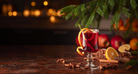 Christmas mulled wine with citrus, cinnamon, anise, and rosemary.