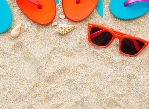 sunglasses and starfish on the beach