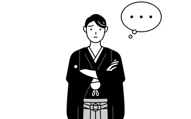 Man wearing Hakama with crest with crossed arms, deep in thought.