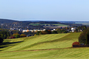 Fototapeta na wymiar Green fields near the Goltzsch viaduct in Reichenbach-im-Vogtland, Germany