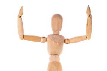 A wooden mannequin holding a knife in its hand. This image can be used to depict concepts such as danger, violence, or even art projects involving sculptures or theater props.