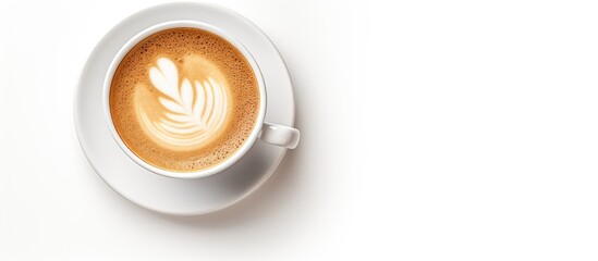 A cappuccino coffee cup on a white background seen from above and bathed in soft light - obrazy, fototapety, plakaty