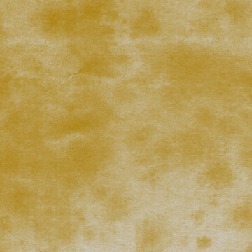 Old brown paper parchment background with distressed vintage stains and ink spatter, elegant antique beige color. Royalty high-quality free stock photo image of Vintage paper texture