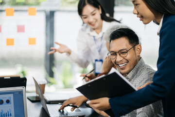 Happy smiling businessman feel happy work complete Teamwork success, success at work in the office concept.