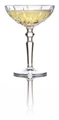 Champagne cup with sparkling wine isolated on white reflective surface. Real studio photo shot.