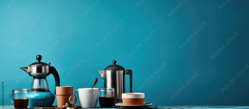 Canvas Prints Coffee varieties served with milk and tools on a blue table