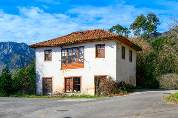 Fototapeta na wymiar Old closed school in the village of Cofino, Asturias, Spain