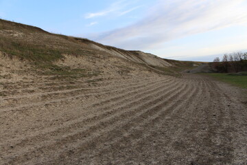 A dirt road in a hilly area