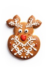 Overhead flat view of a christmas cookie in the shape of a christmas reindeer on white background 