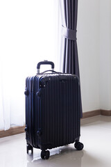 Black travel bag,Luggage or suitcases in modern hotel during check-in It's time to travel, service, travel, summer vacation and vacation concept. 