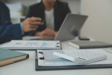 Team of business people are meeting to analyze data for marketing plan,Market research reports and income statistics, Financial and Accounting concept.