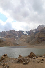 Mutnyi lake with Chimtarga pass in the background located under the highest peak of Fann mountains - Chimtarga, Tajikistan