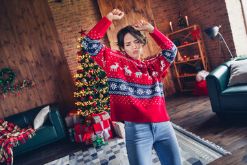 Photo of pretty adorable young lady dressed knitted ugly red sweater dancer relax atmosphere...