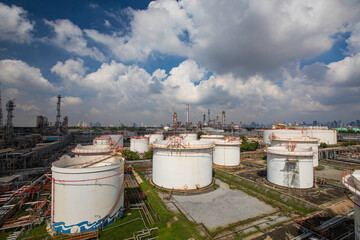 Tank farm in industry Thailand with white oil and petrol silos