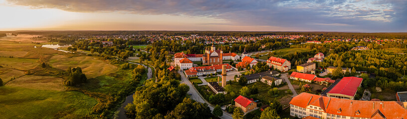 Aerial panorama of the Suprasl River valley at sunrise in Podlasie.