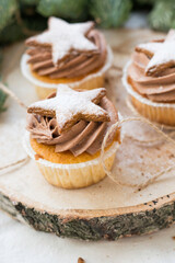 Gingerbread cookies star shaped perfect for christmass and new year on natural wooden background close up selective focus