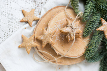 Gingerbread cookies star shaped perfect for christmass and new year on natural wooden background...