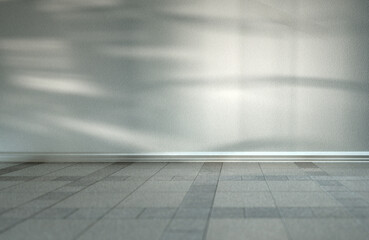 Empty room with granite floor with window shade falling in daylight.
