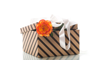 gift box with ribbons and beautiful roses inside.