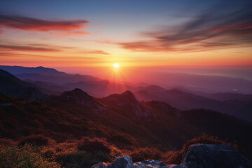 Mountain landscape at sunset, view from the top of the mountain