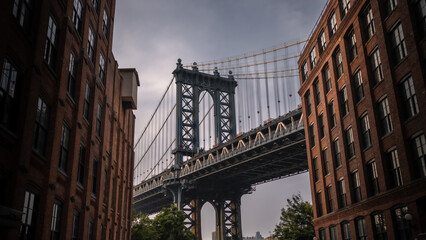 Photograph of the Manhattan Bridge from the Dumbo district in New York at sunset.