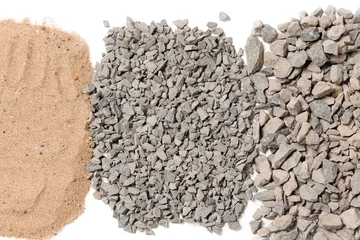Foto auf Acrylglas Raw construction materials, pile of sand and gravel or crushed stone for on white isolated background © Parilov