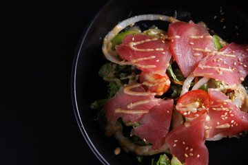 Japanese salad isolated in black background