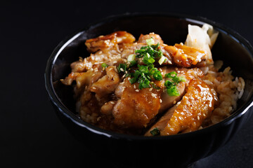 Grilled Chicken teriyaki rice Japanese food isolated in black background - 667213915