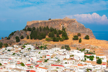 Obraz premium Lindos fortress over old town, Rhodes island, Greece