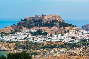Fototapeta premium Lindos town cityscape and Lindos acropolis, Rhodes island, Greece