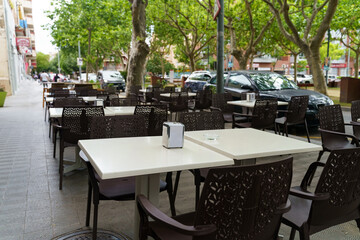 Empty street restaurant on a city street.