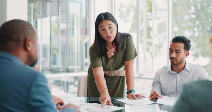Woman, leader and presenter in meeting, team and conversation for marketing schedule, planning and brainstorming in office. Asian female, manager and discussion for business growth and group project.