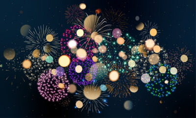 Fireworks background with bokeh. Abstract colorful New Year background.