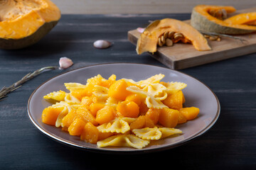 Pasta with pumpkin. Vegetarian autumn dish.