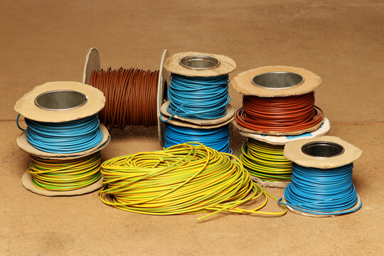 Spools of electric wire, earth live and neutral.