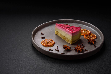 Delicious sweet cheesecake cake with mascarpone cheese, raspberries and jam