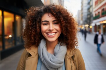 Close up portrait happy wide toothy smiling Hispanic Latin young ethnic woman girl female student tourist traveler successful businesswoman walking city street outside holidays weekend travelling trip - obrazy, fototapety, plakaty