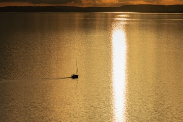 Sailing boat in the sunset
