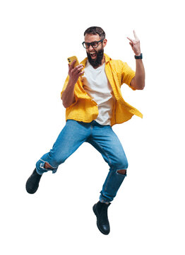 Jumping, running man with a smartphone in hand, feels joy, celebrates winning the lottery or sports bets. Human face emotions and betting concept. Collage in magazine style. Discount, seasonal sales