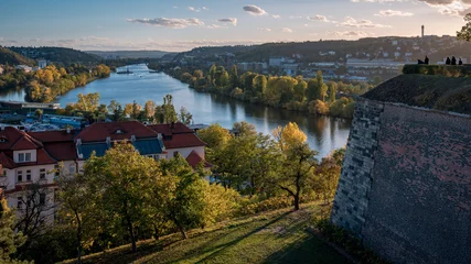 Foto op Plexiglas Beautiful autumn day full of sun from Prague's Vyšehrad. View of the Vltava river. © Premysl