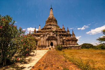 Fototapeta premium Exterior of a white pagoda in Bagan, Myanmar, Asia