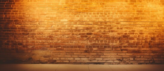 Aged brick wall in warm light suitable for background or wallpaper