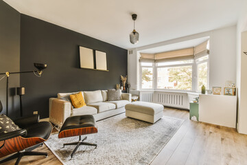 Living room with furniture and bay window