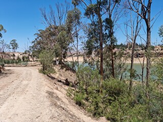 Fototapeta premium A park next to a large lake and a forest in the city of Tiaret, Algeria