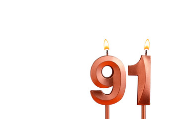 Burning candle number 91 for birthday on white background