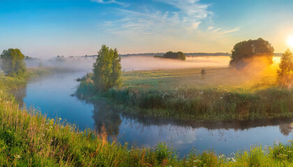 Fototapeta na wymiar panorama of a summer landscape with sunrise fog and the river