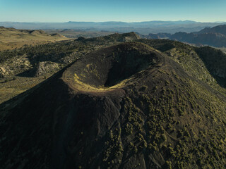 Aerial view of a cinder cone volcano crater in Utah, USA © A Beautiful World