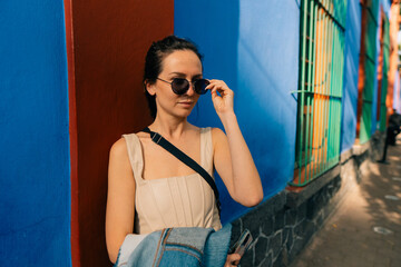 girl next to the Frida Kahlo Museum in Mexico