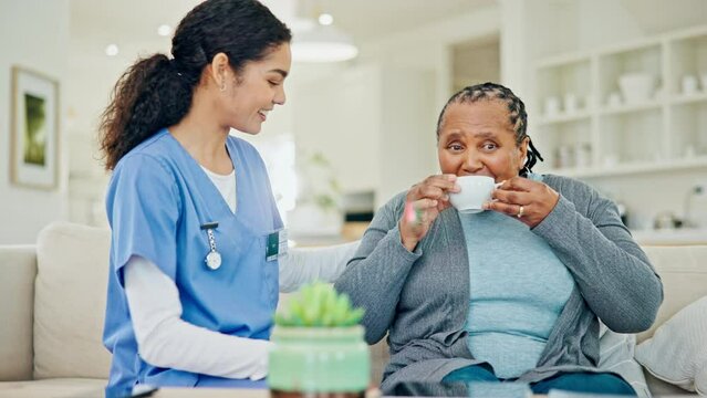Tea, mature patient and happy woman, caregiver or volunteer for homecare service, medical support or drinking cacao beverage. Nursing home, talking client and nurse with morning latte, coffee or coco