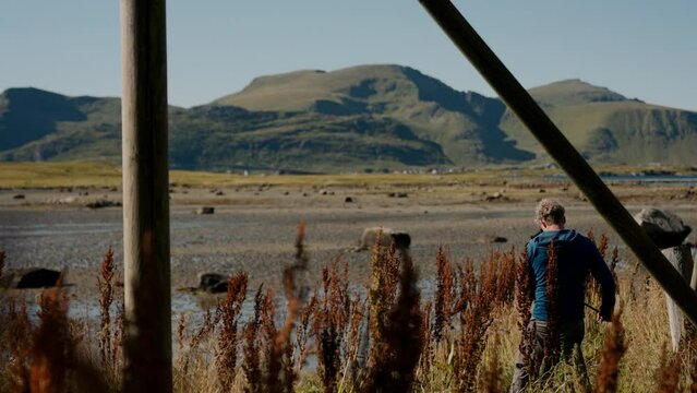 Man Professionally Captures The Distant Mountains